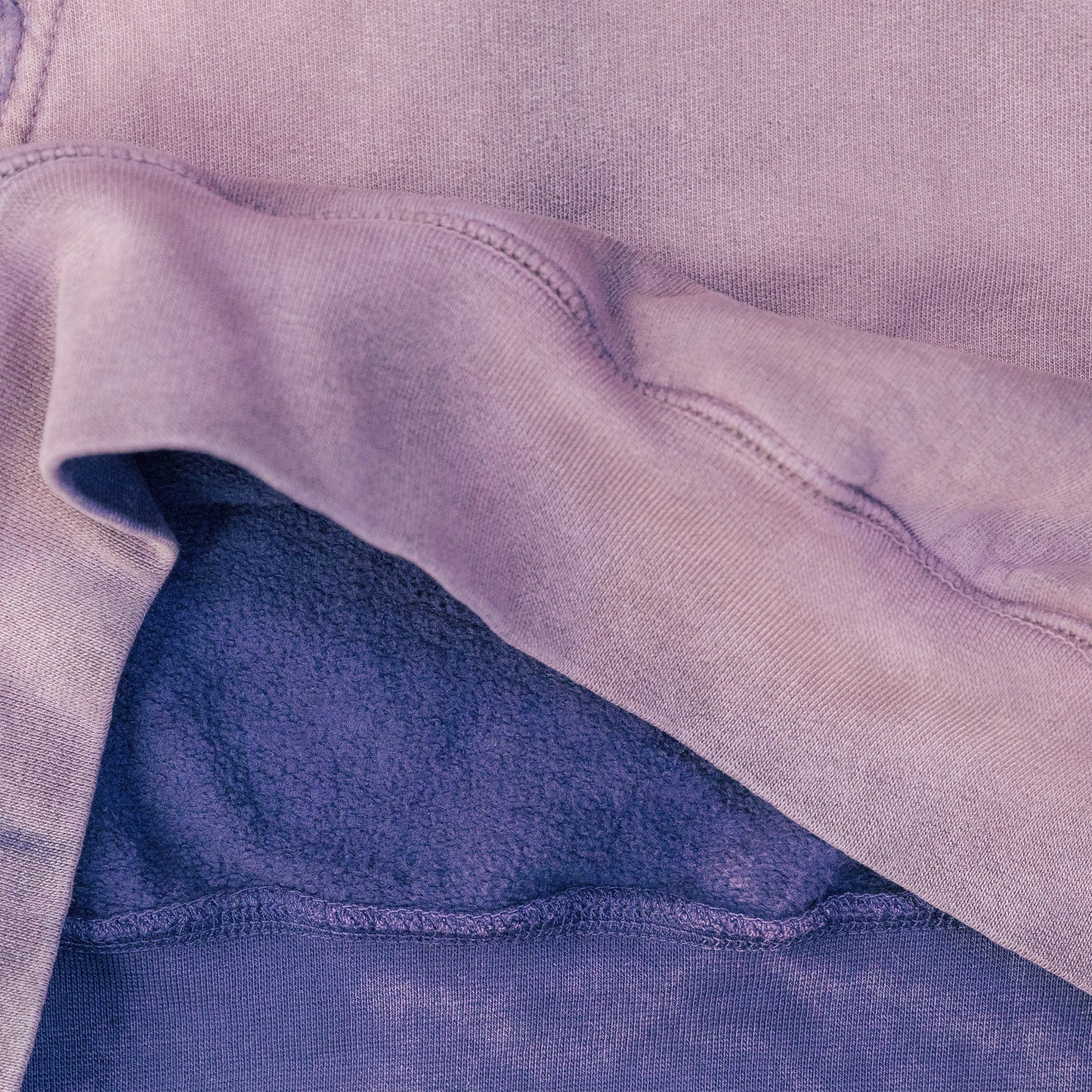Close-up of a purple fabric with a textured surface