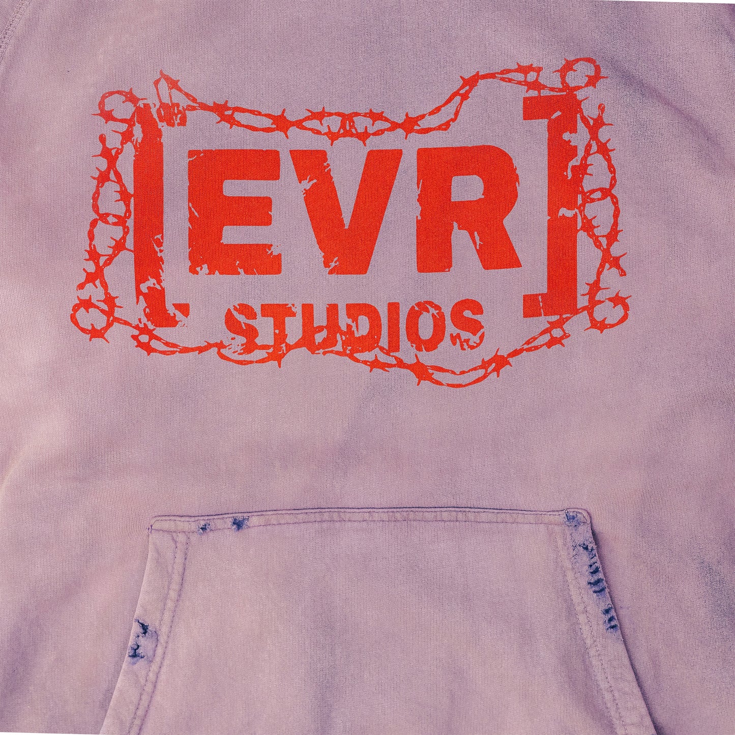 purple colored hoodie with red 'EVRI STUDIOS' text and barbed wire design.