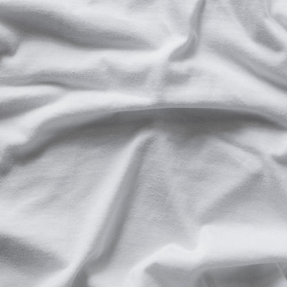Close-up of white fabric with folds