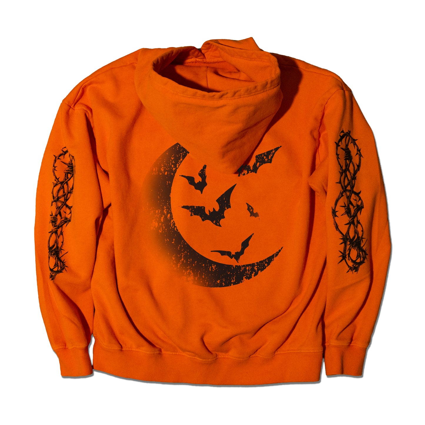 Orange hoodie with crescent moon design featuring a moon, and bats.