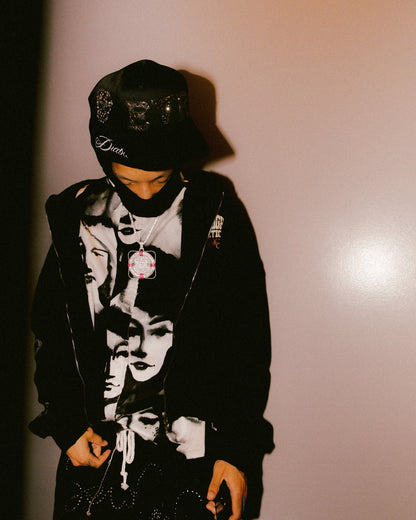 male model wearing rhinestone and pearl hand made baseball cap