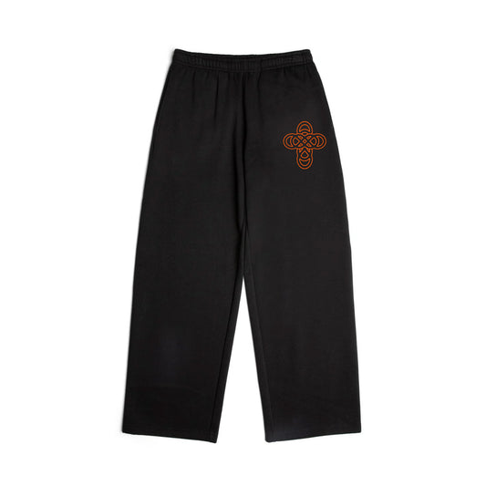 Black pants with a brown logo on a white background