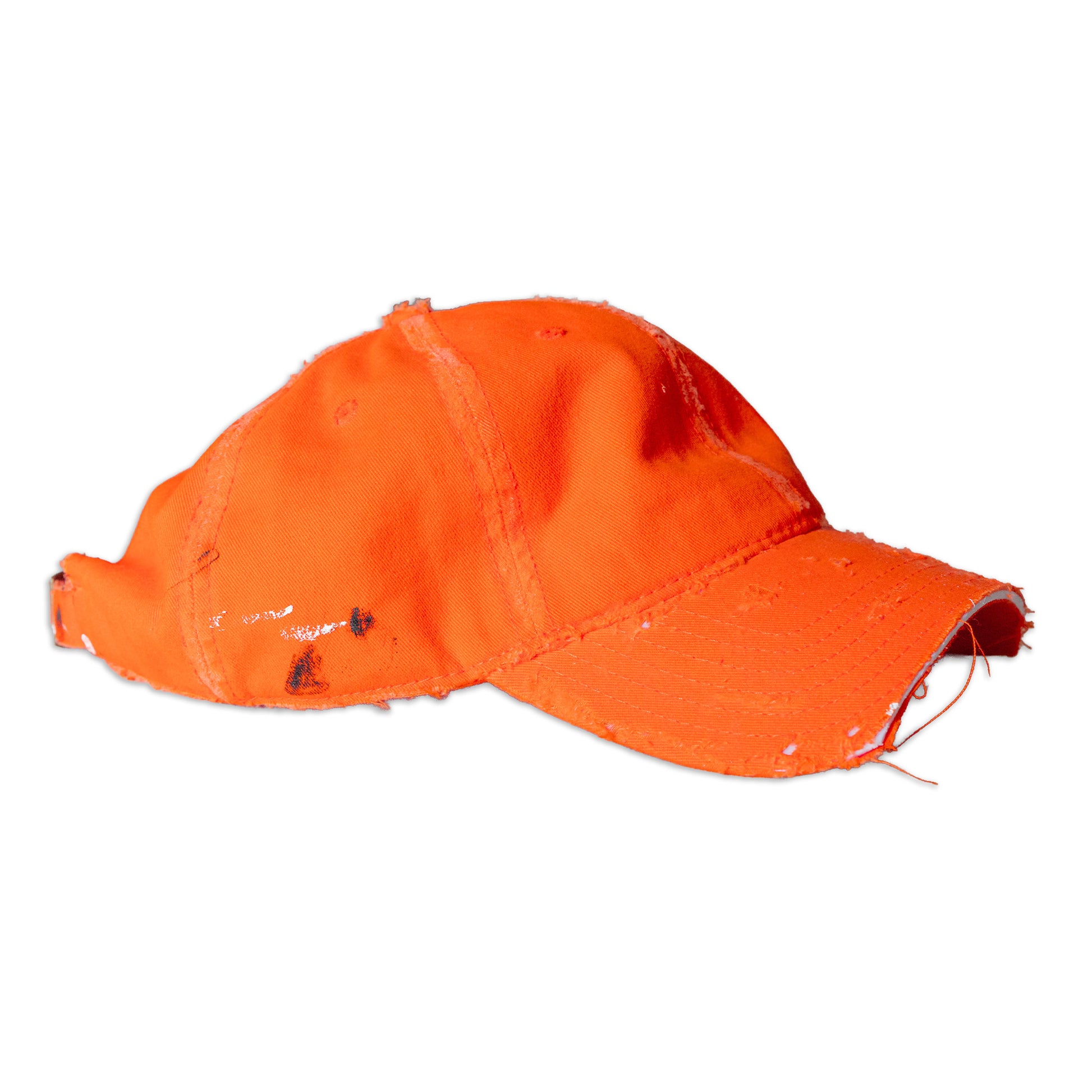 Orange cap with visible wear on a white background