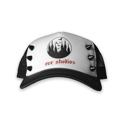 White cap with spikes, black visor and logo on a white background