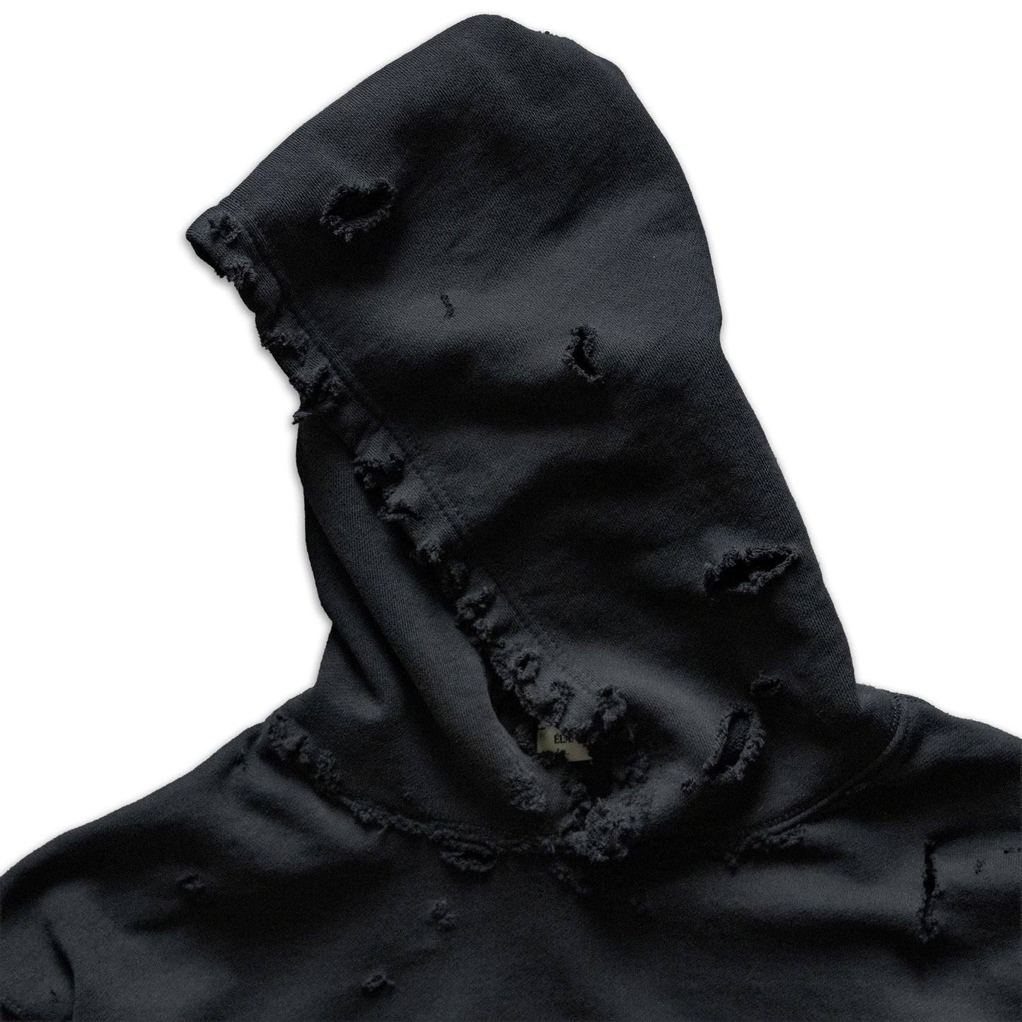 Black hooded garment with frayed edges on a white background