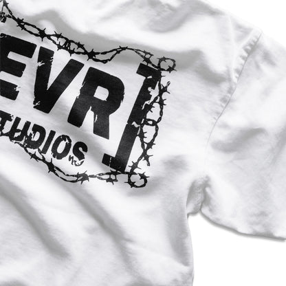 White shirt with black barbed wire design and 'EVR Studios' text on a white background