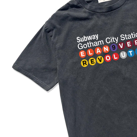 Black t-shirt with colorful text design on a white background